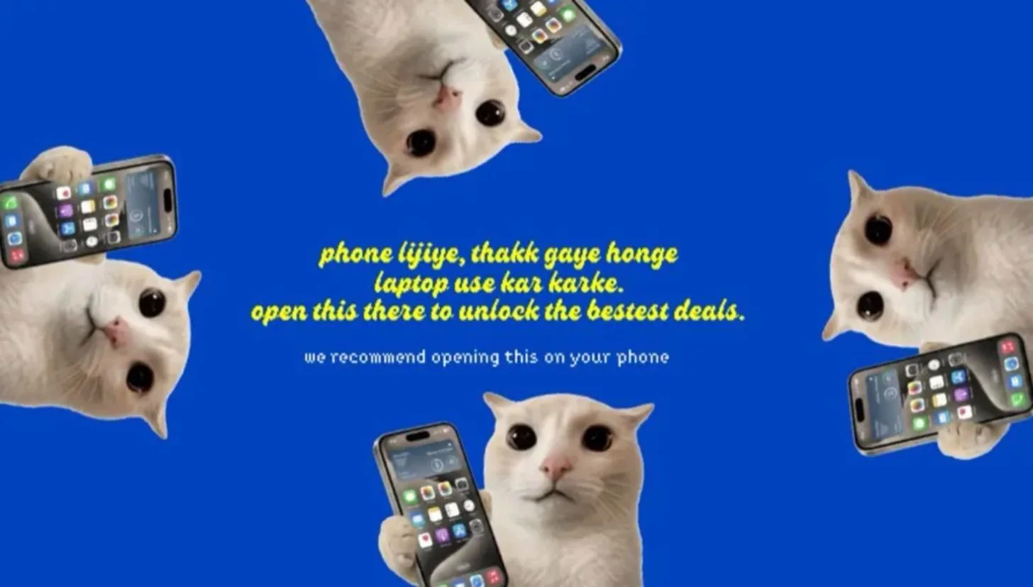 Opened on a laptop: the site asks you to switch to your phone
